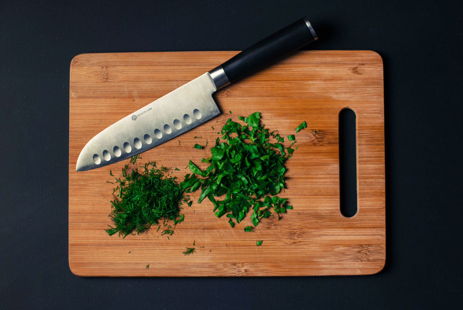 Nikon D60 + Nikon AF-S Nikkor 50mm F1.4G sample photo. Food, knife, dill, chopped photography