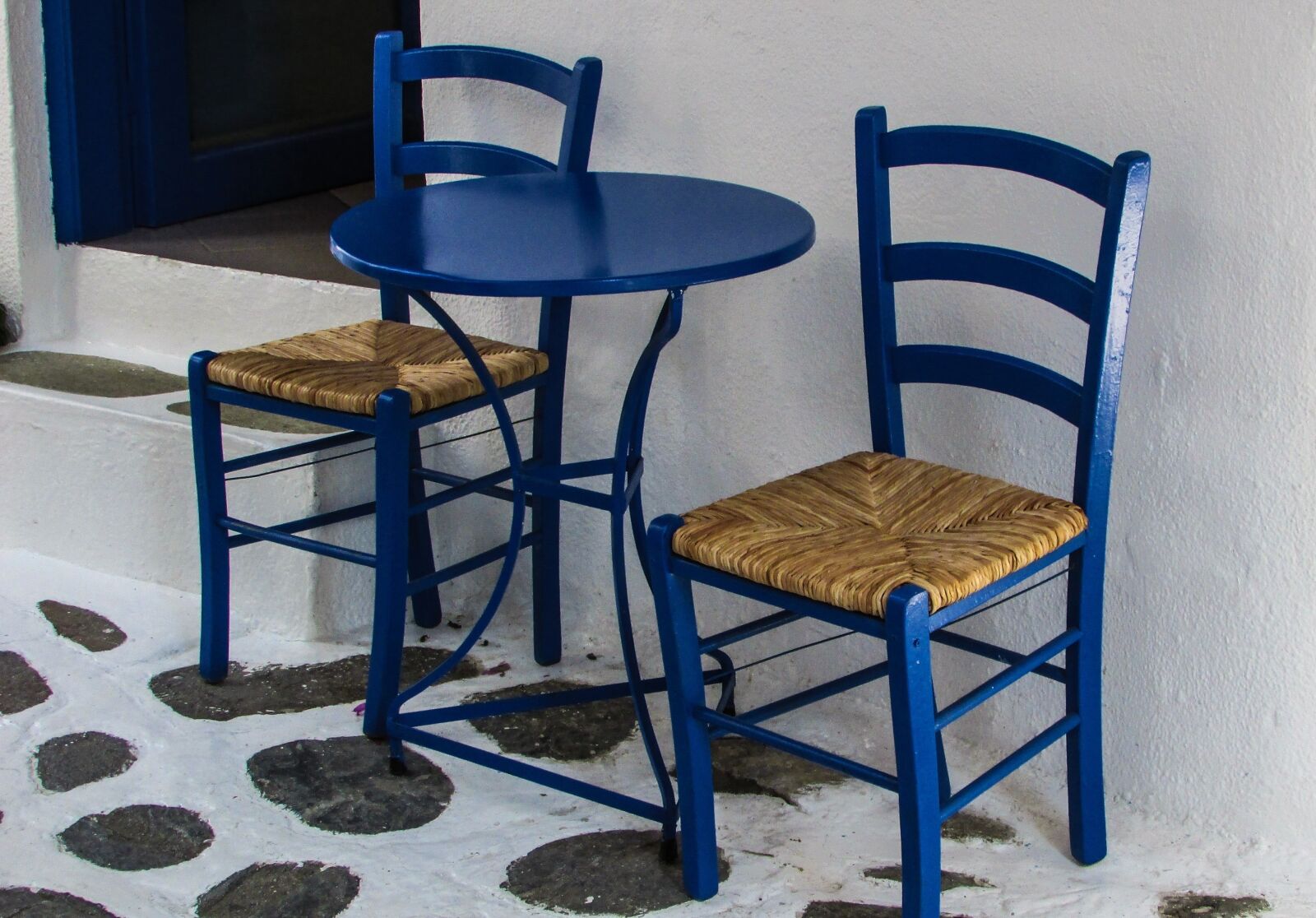 Canon PowerShot SX400 IS sample photo. Chairs, table, blue photography