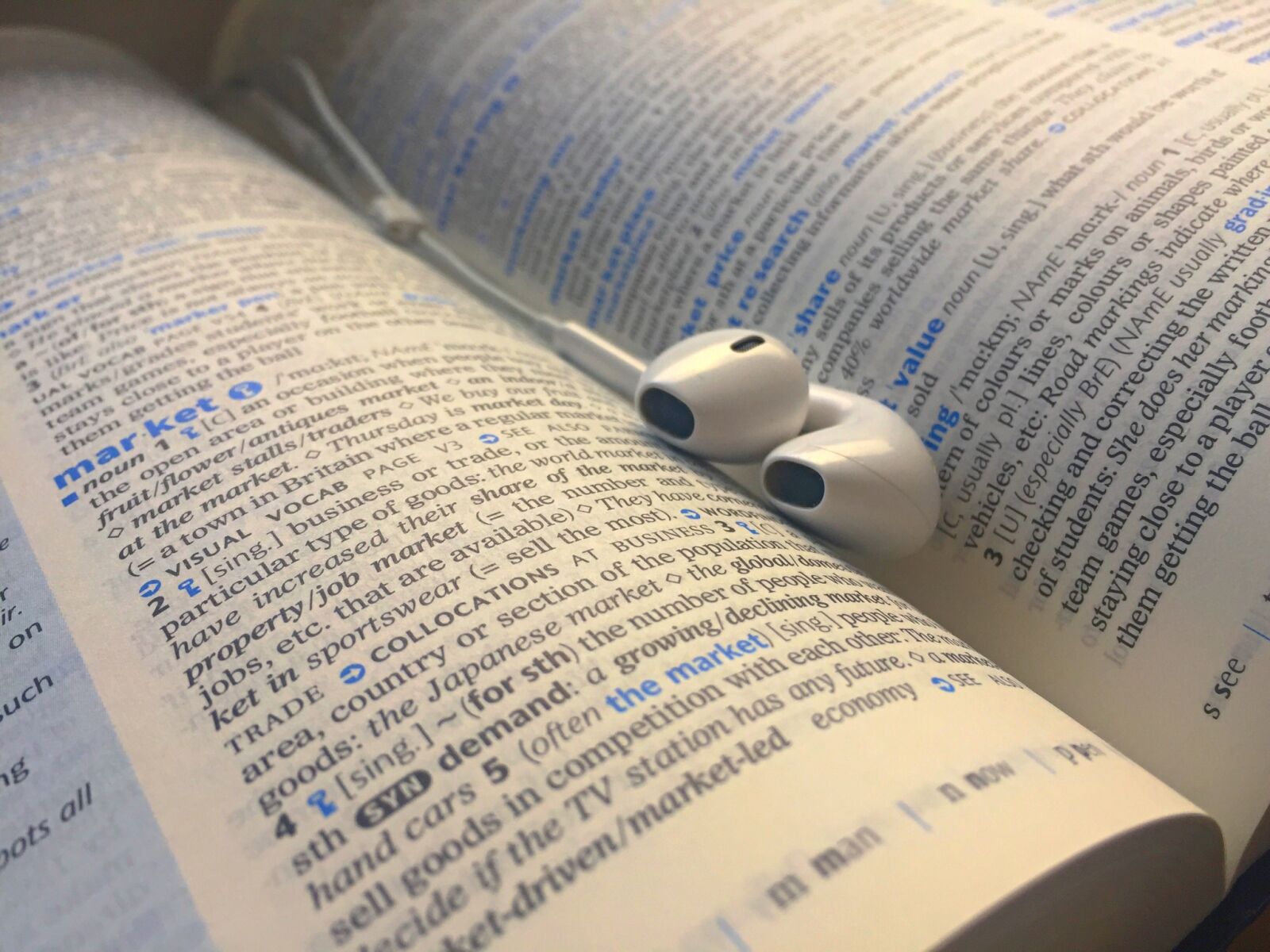 iPhone 6 back camera 4.15mm f/2.2 sample photo. Book, headphones, music, book photography