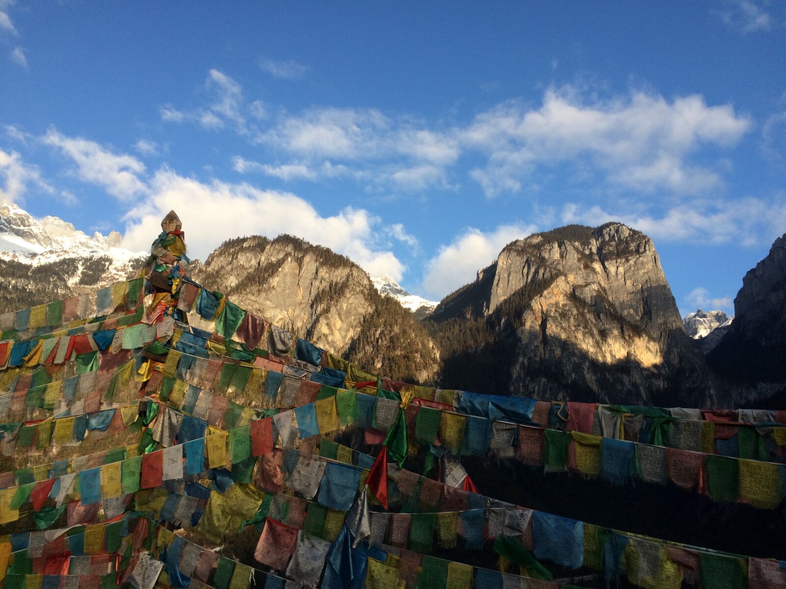 iPhone 5s back camera 4.15mm f/2.2 sample photo. Shangri-la's, prayer flags, in photography