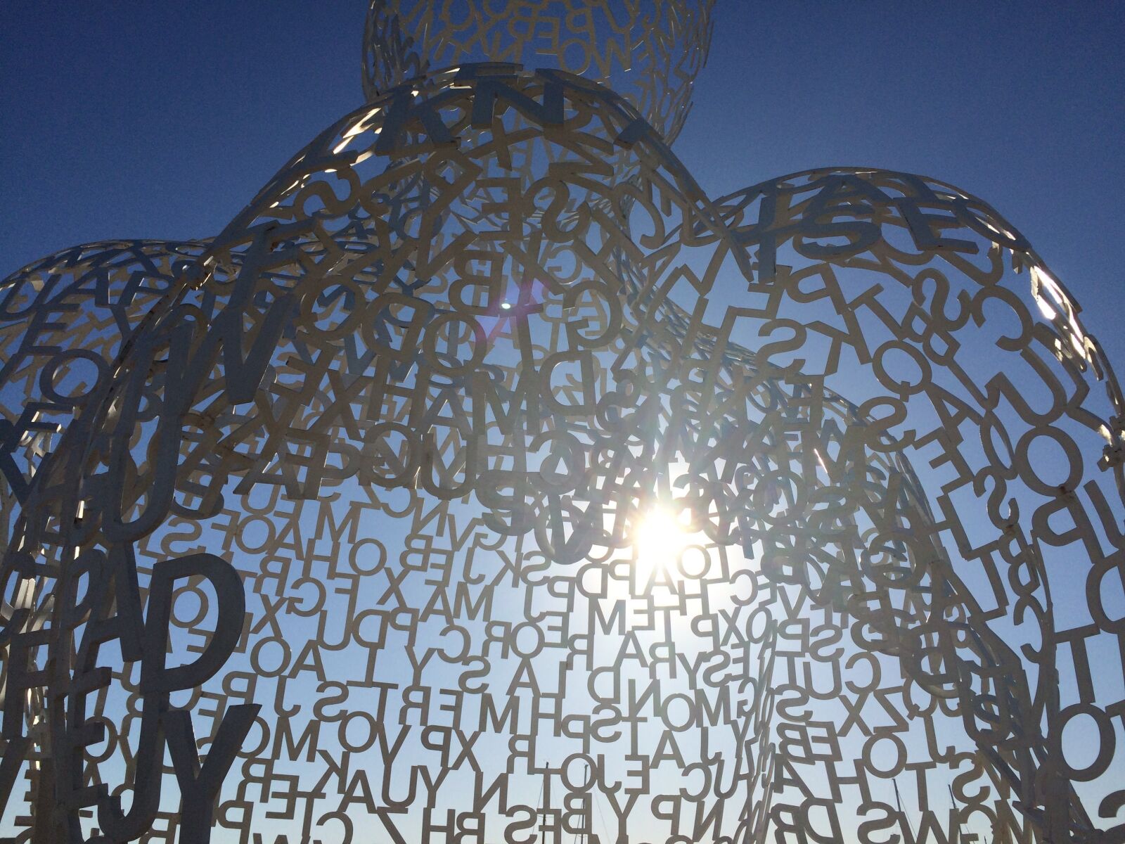 iPhone 5s back camera 4.15mm f/2.2 sample photo. Letters, sculpture, sky photography