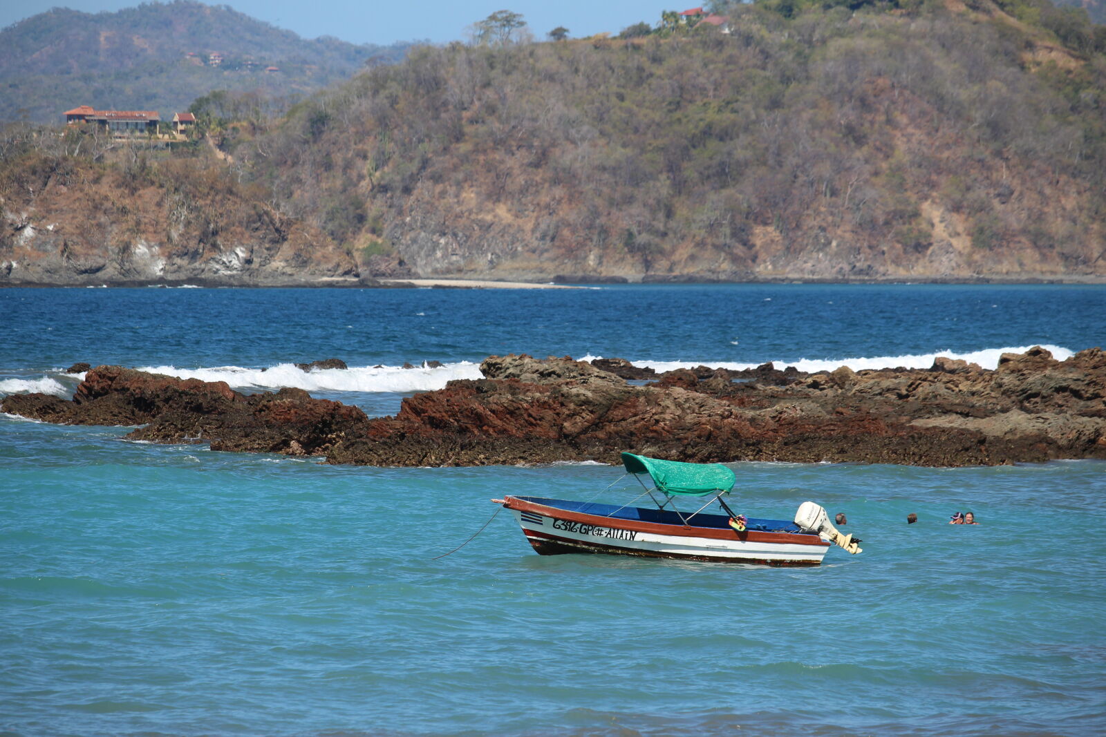 Canon EF-S 55-250mm F4-5.6 IS STM sample photo. Beach, blue, water, boat photography