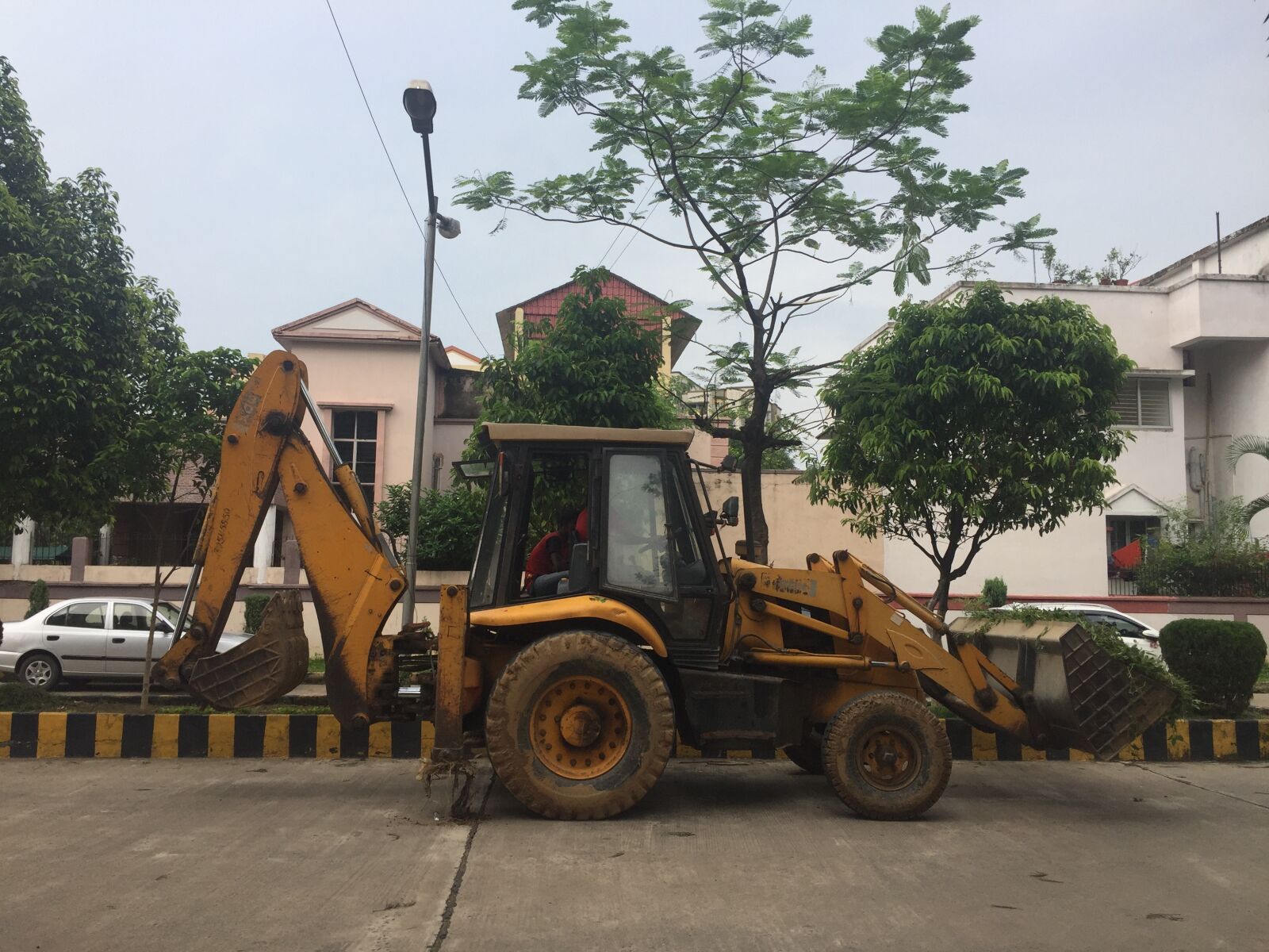 iPhone 6 back camera 4.15mm f/2.2 sample photo. Jcb, excavator, india photography