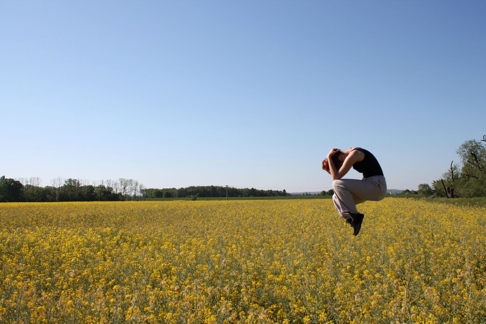 Canon EOS 1100D (EOS Rebel T3 / EOS Kiss X50) sample photo. Oilseed rape, international women's photography