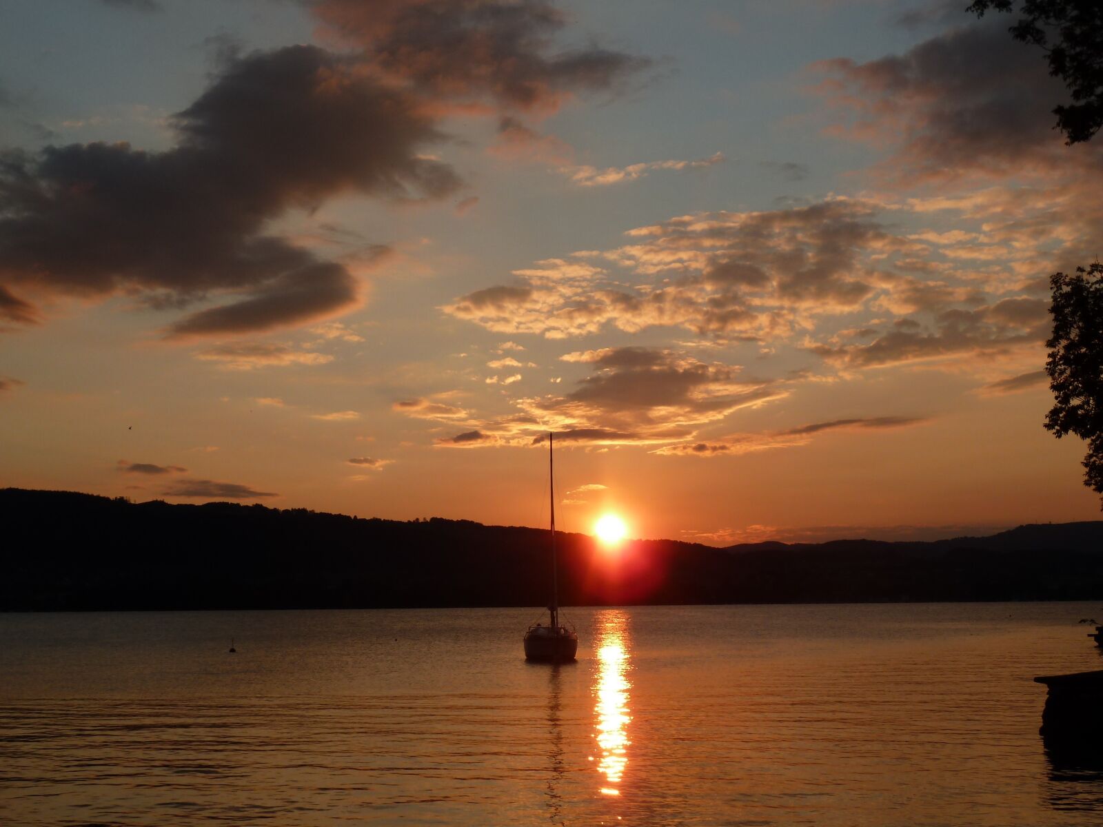 Panasonic Lumix DMC-ZS7 (Lumix DMC-TZ10) sample photo. Sunset, lake, boat photography