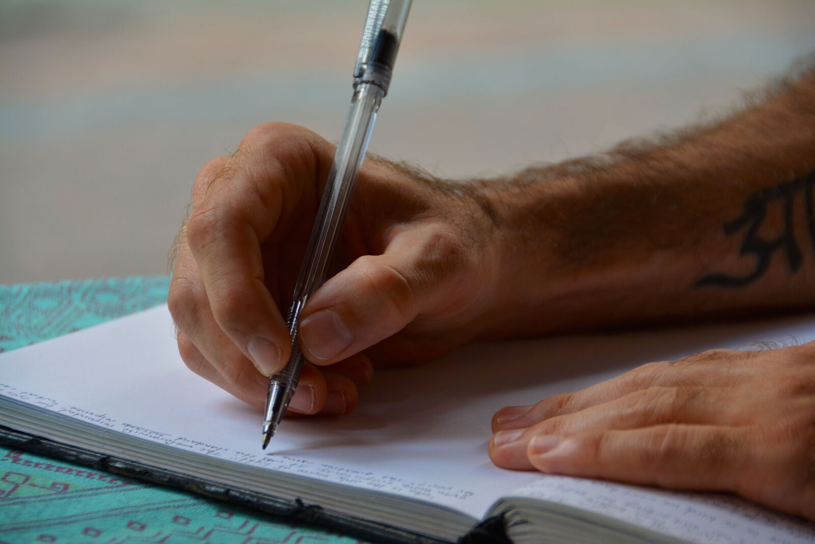 Nikon D5200 sample photo. Hands, writing, diary photography
