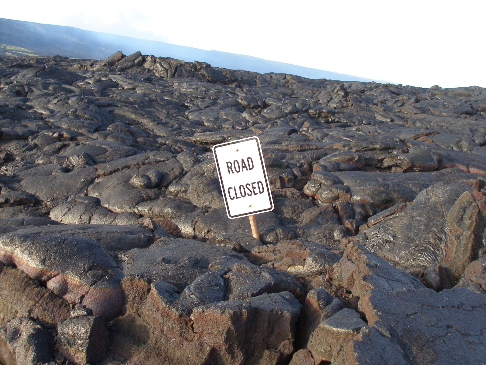Olympus SP350 sample photo. Road closed, lava, volcano photography