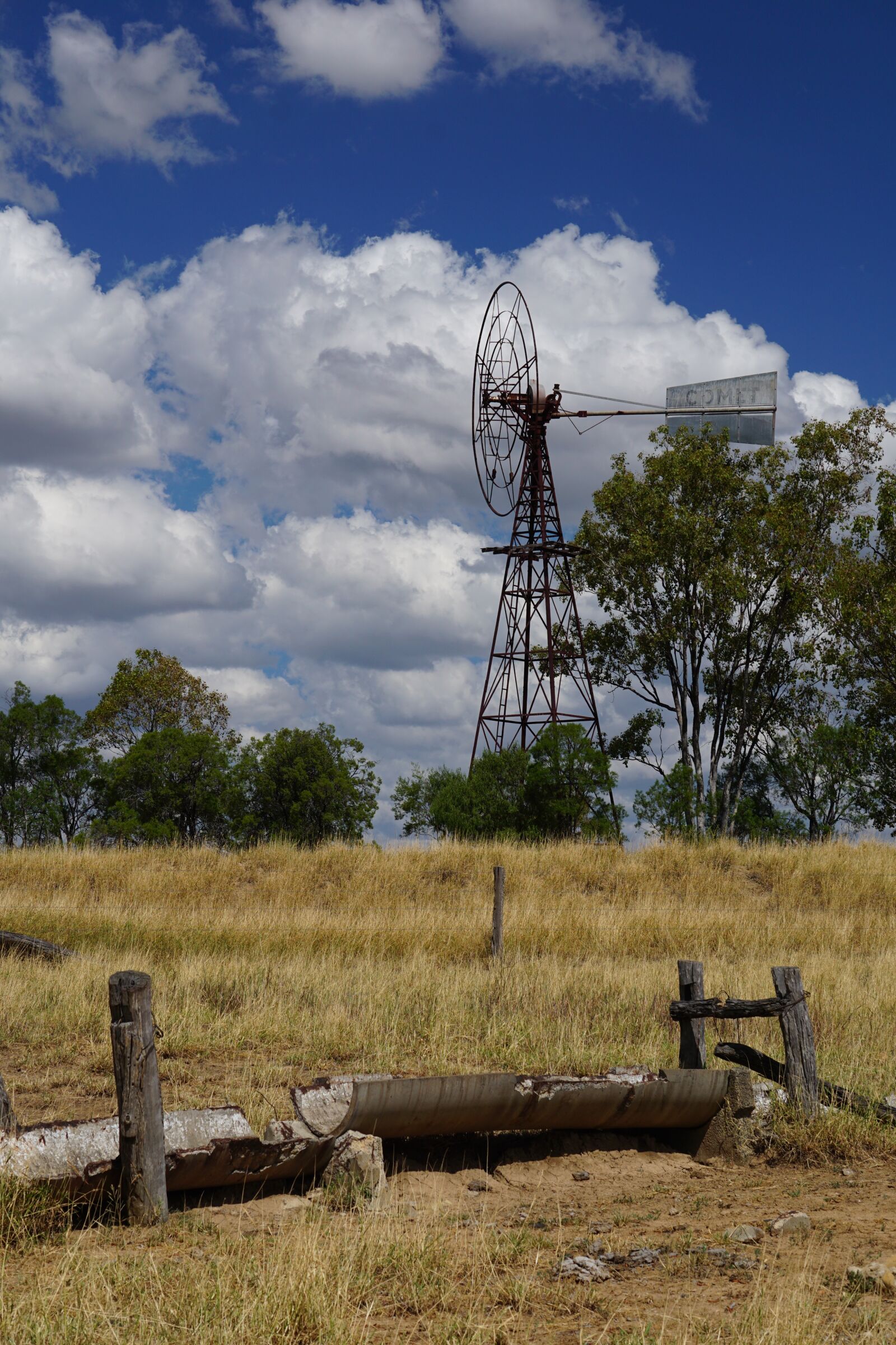 Sony E 55-210mm F4.5-6.3 OSS sample photo. Windmill, landscape, farm photography