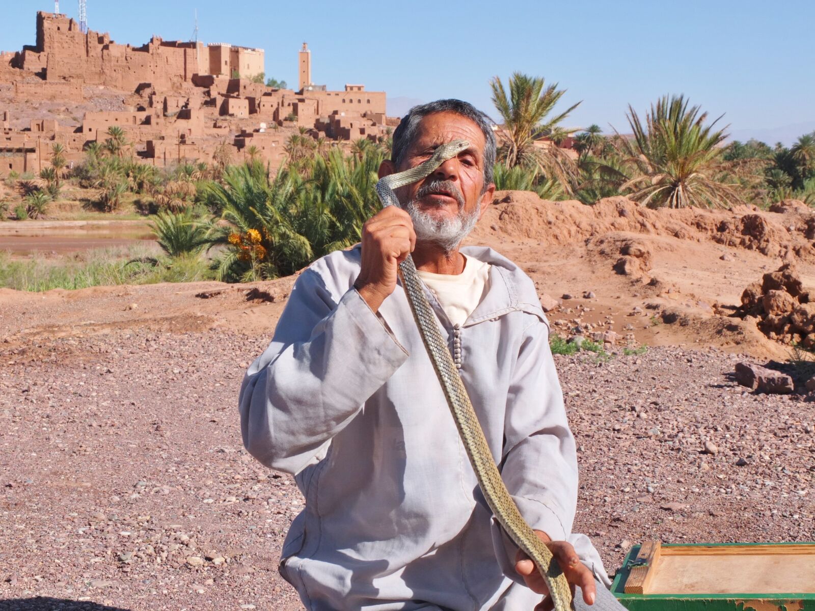 Fujifilm X10 sample photo. Morocco, puppeteer of snake photography