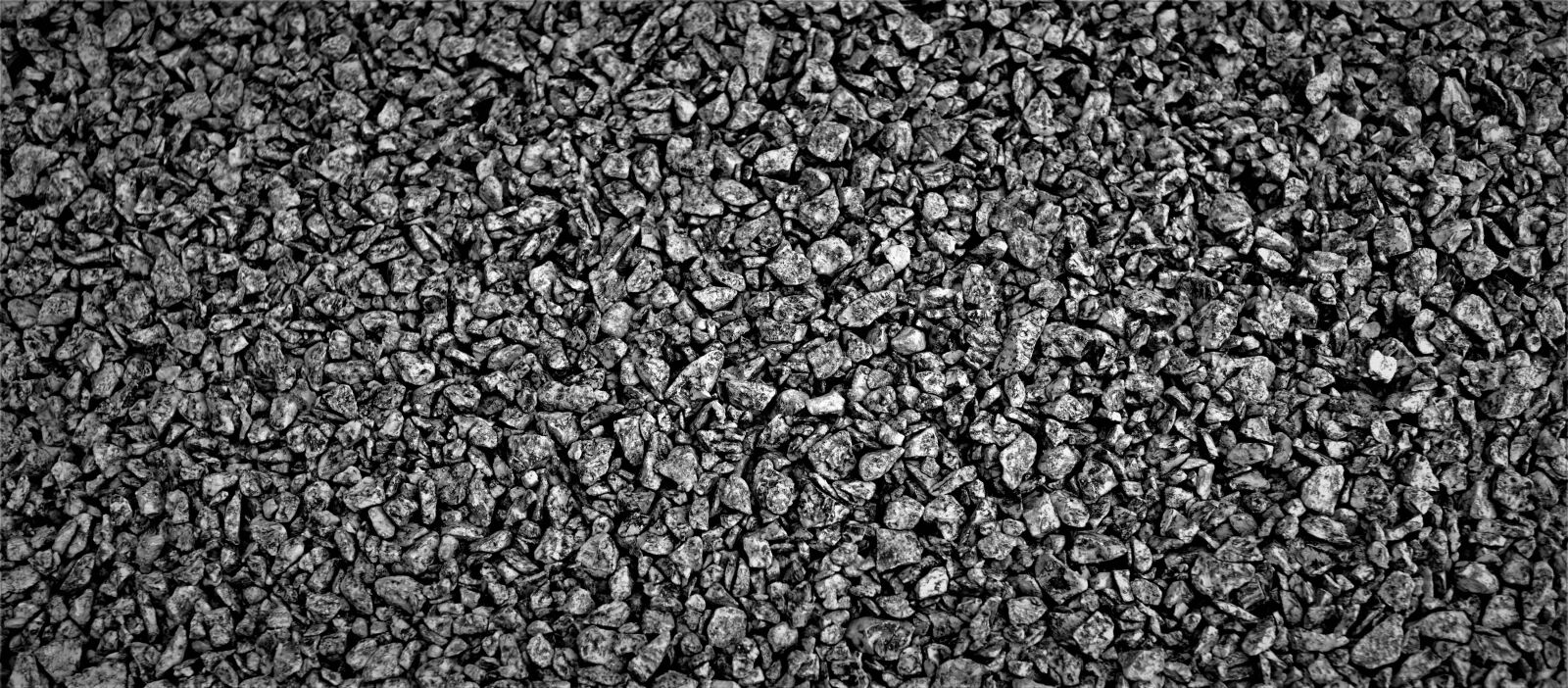 Sony a6000 sample photo. Grit, stones, grey photography