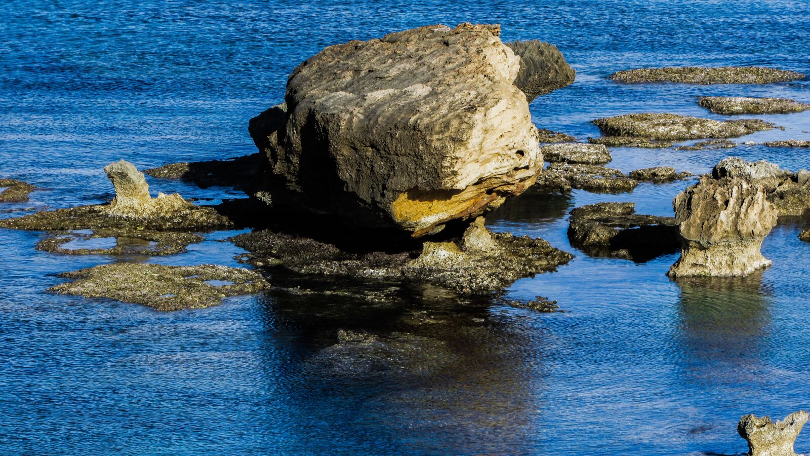 Canon PowerShot SX400 IS sample photo. Rock, sea, rocky coast photography