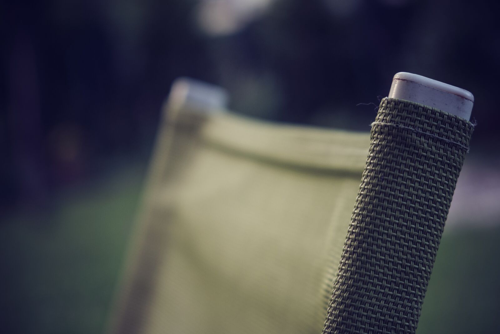 Fujifilm XF 18-55mm F2.8-4 R LM OIS sample photo. Chair, garden, green photography