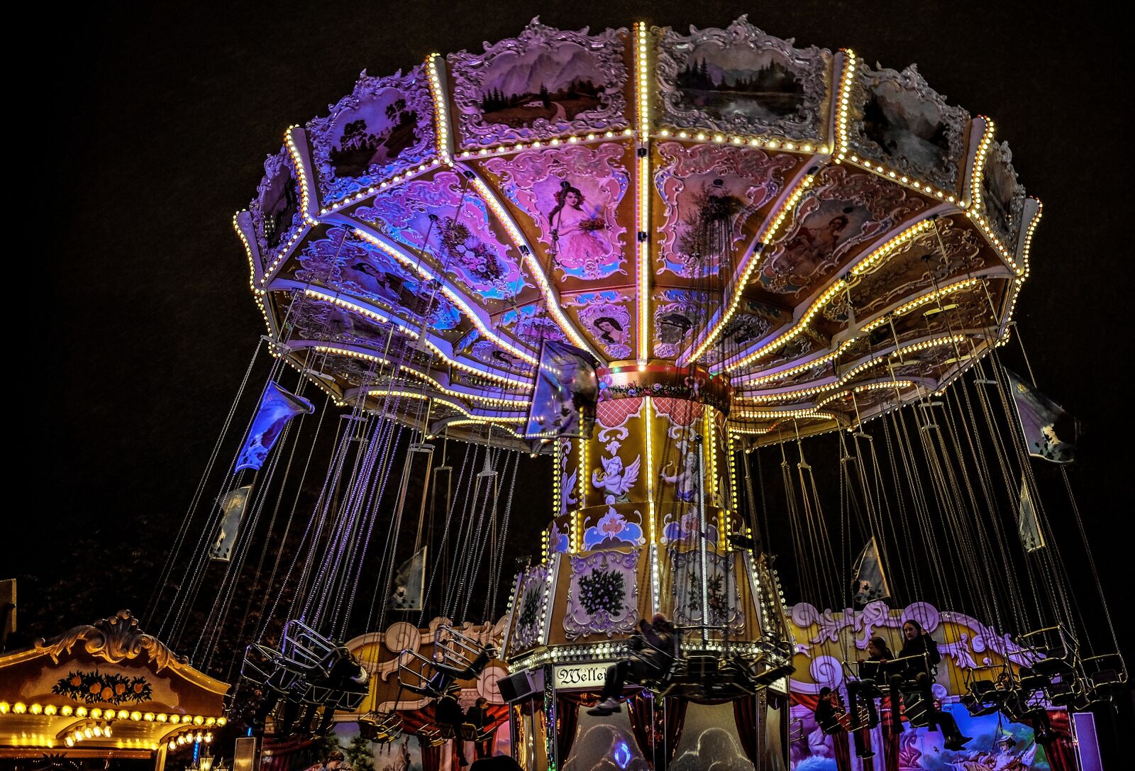 Fujifilm X70 sample photo. Year market, carousel, night photography