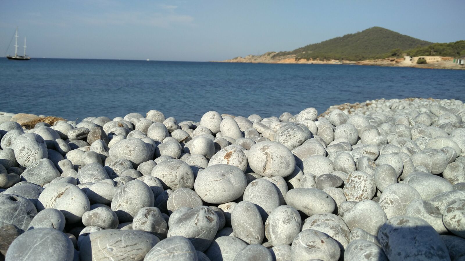 OnePlus ONE A2005 sample photo. Ibiza, beach, stones photography