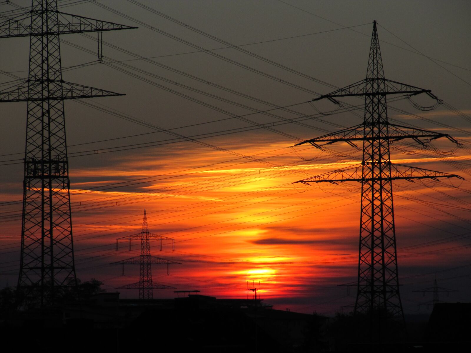 Canon PowerShot SX200 IS sample photo. Sunset, power poles, dusk photography