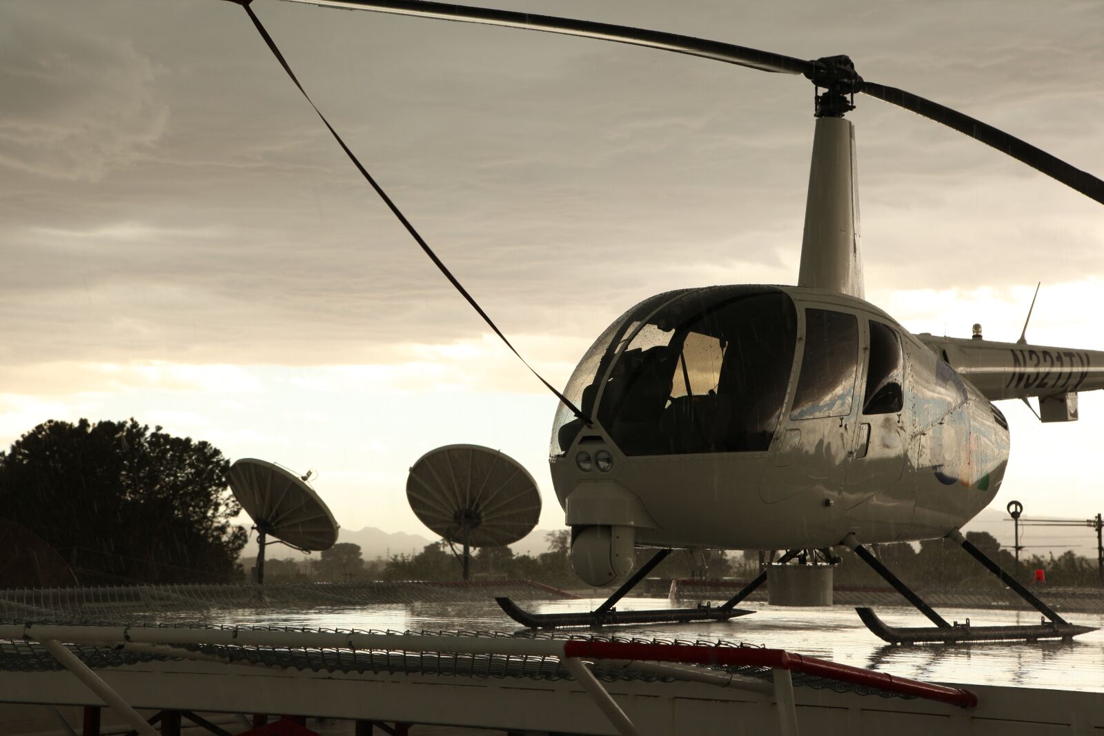 Canon EOS 5D Mark II sample photo. Helicopter, storm clouds, rain photography