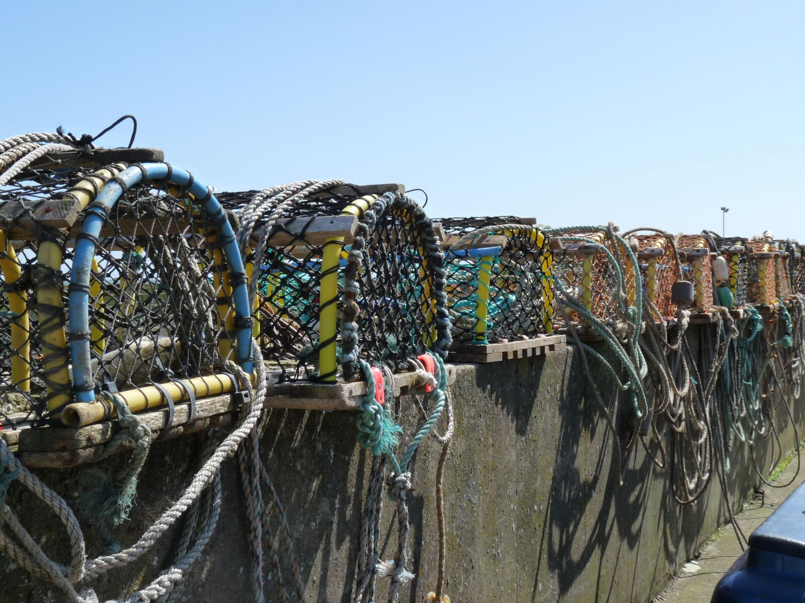 Panasonic Lumix DMC-FZ28 sample photo. Fish traps, sea, fish photography