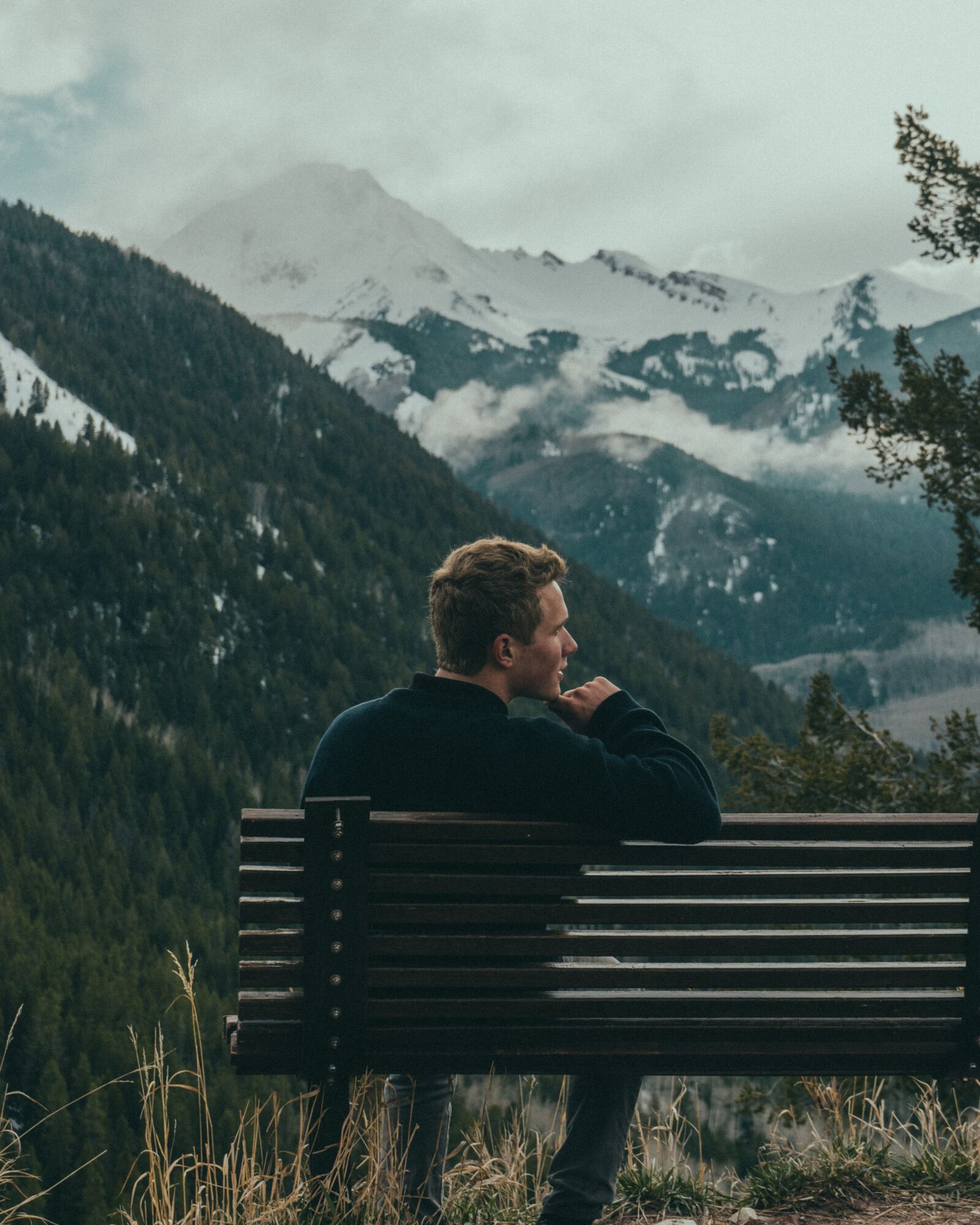 Sony a7 + Sony FE 28-70mm F3.5-5.6 OSS sample photo. Bench, man, mountains photography