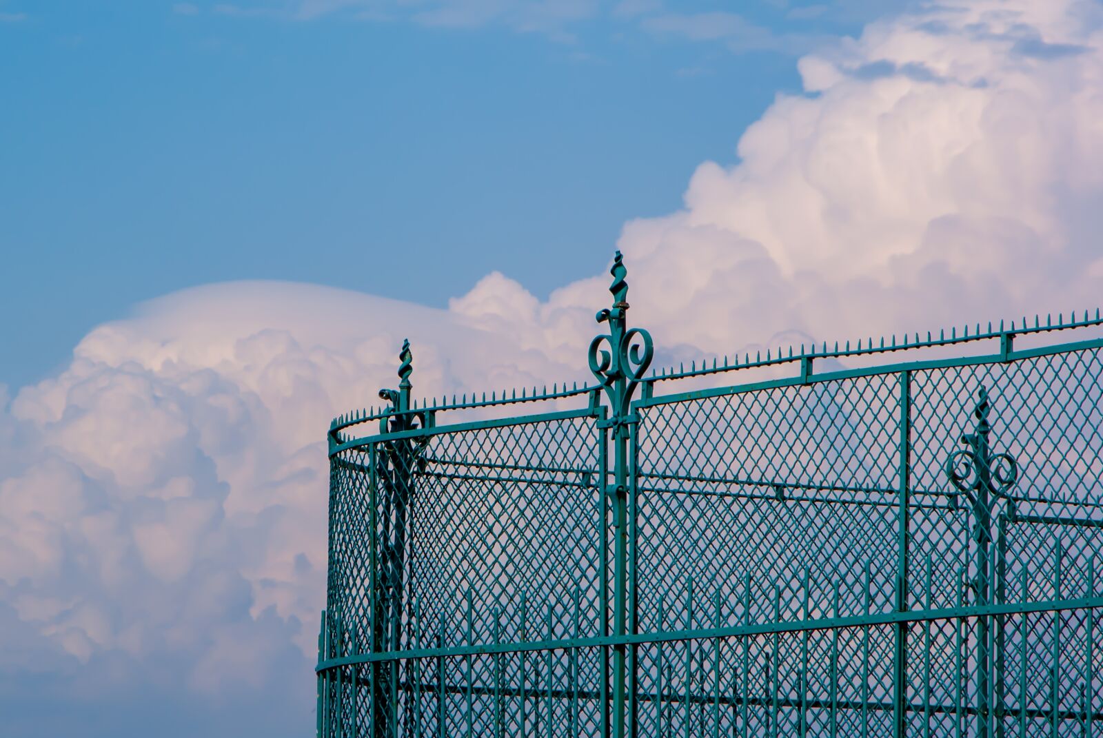 Sony Alpha DSLR-A200 sample photo. Fence, clouds, sky photography