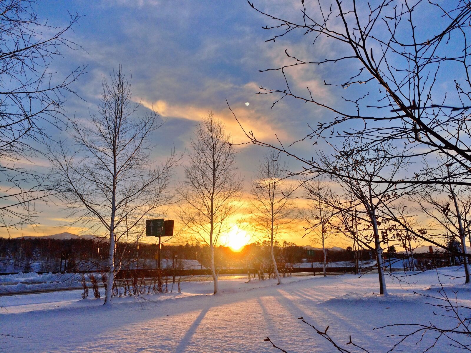 iPhone 5s back camera 4.15mm f/2.2 sample photo. Sunset, snow, sunshine photography
