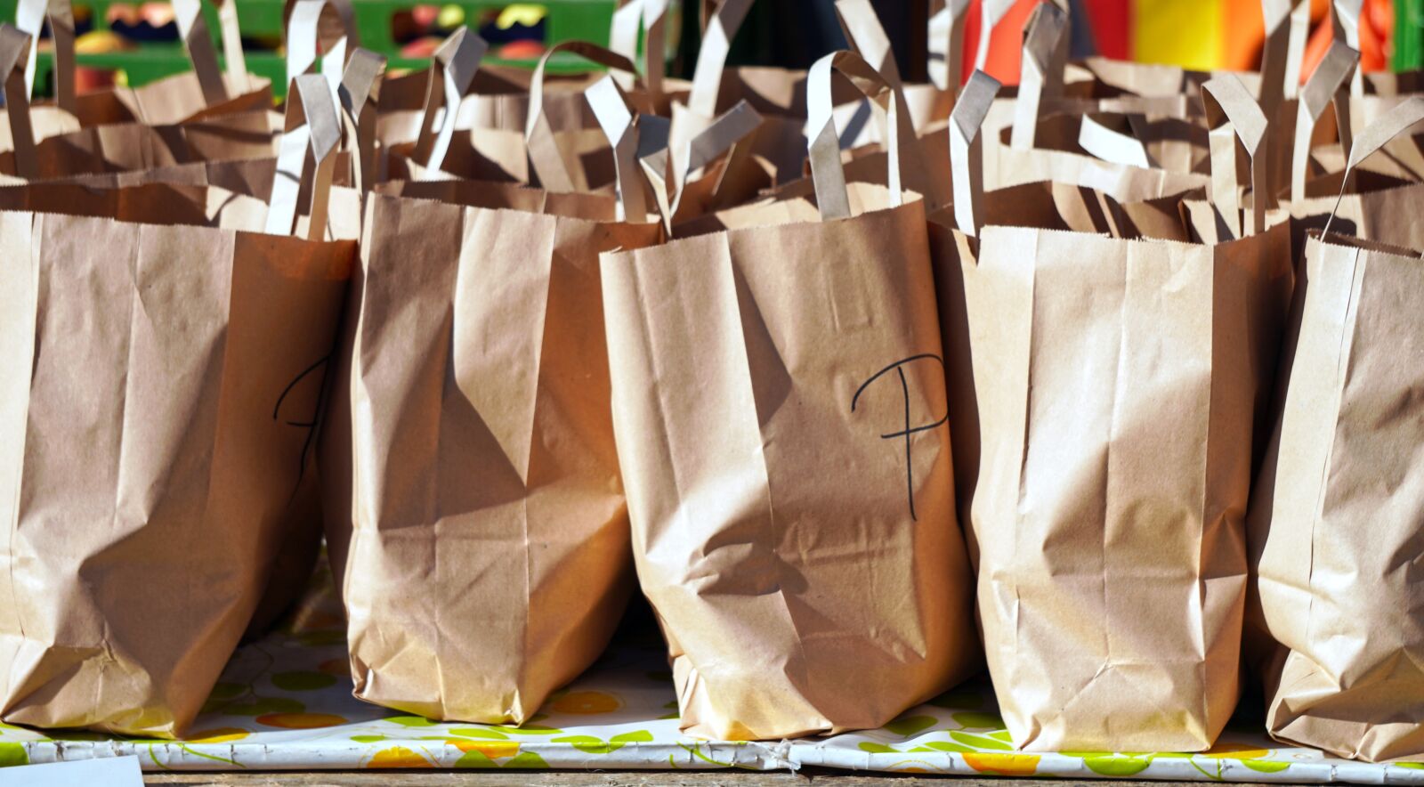 Sony E 55-210mm F4.5-6.3 OSS sample photo. Bags, shopping bags, paper photography