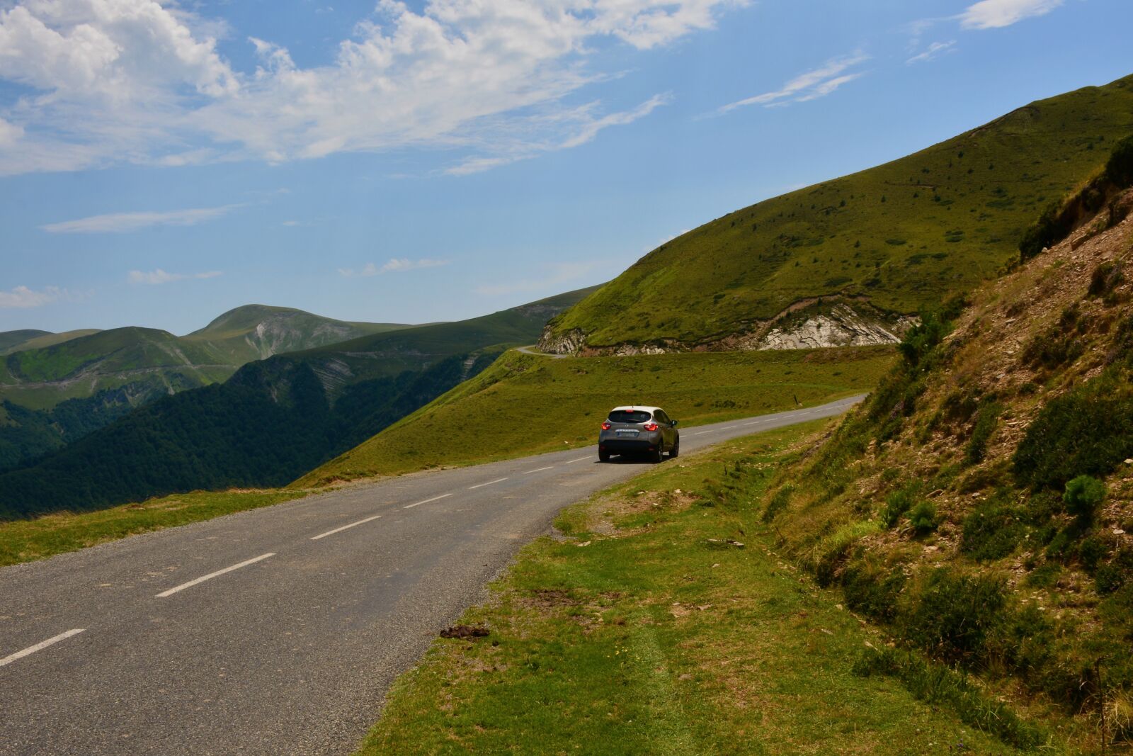 Nikon D7100 sample photo. Road, car, hills photography