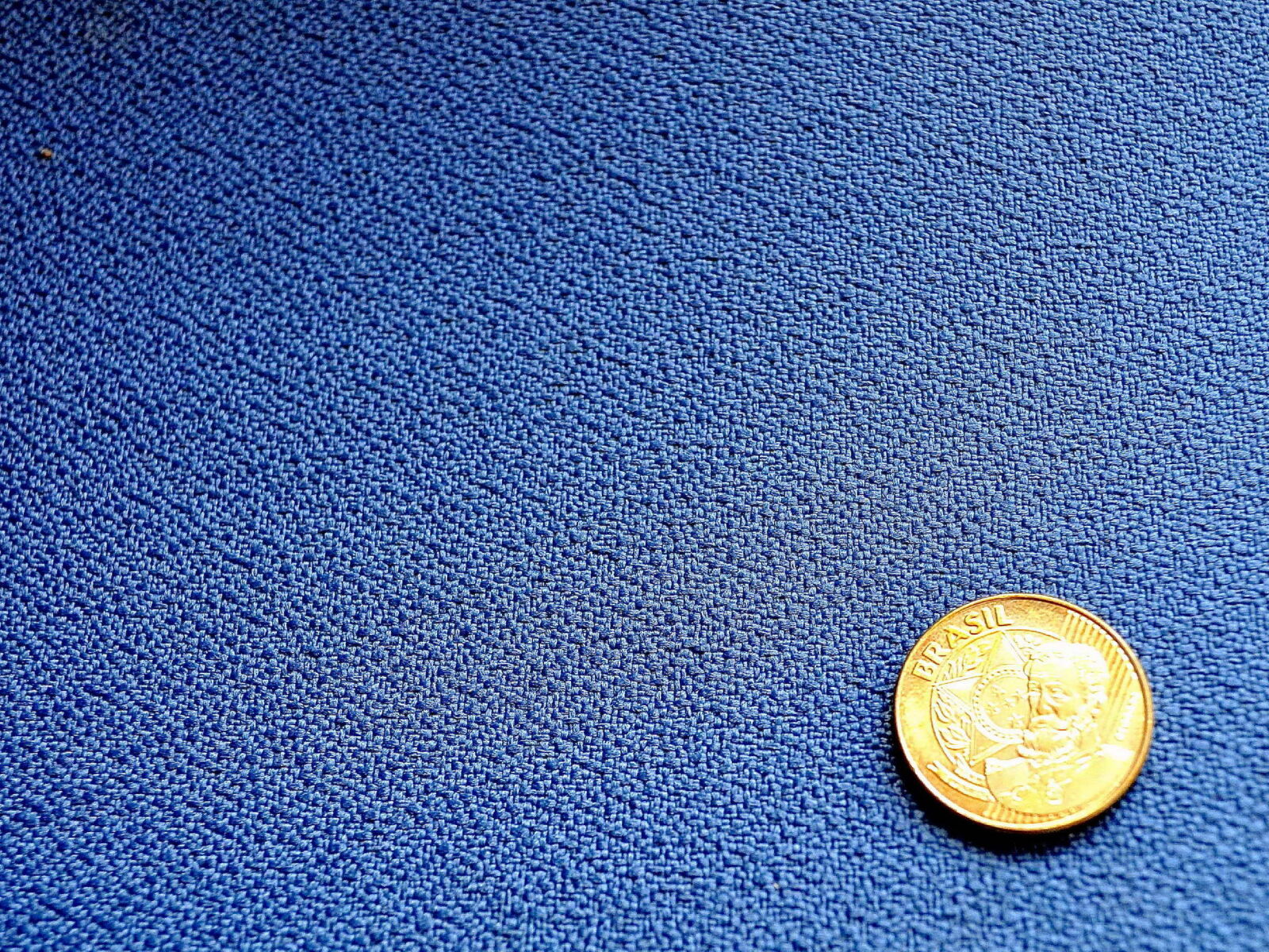Nikon D5000 sample photo. Coin, table photography