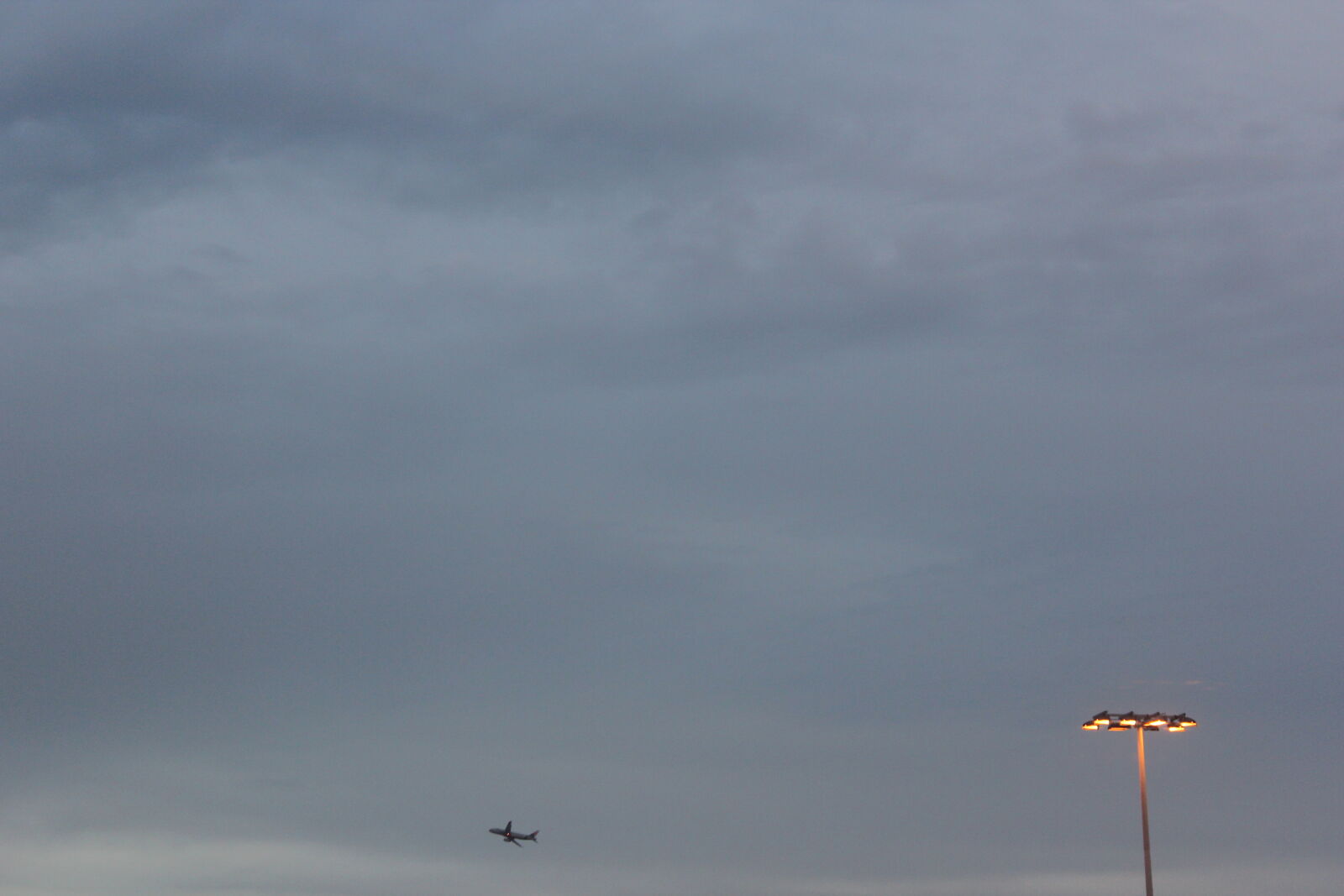 Canon EOS 600D (Rebel EOS T3i / EOS Kiss X5) sample photo. Aeroplane, airport, alone, clouds photography