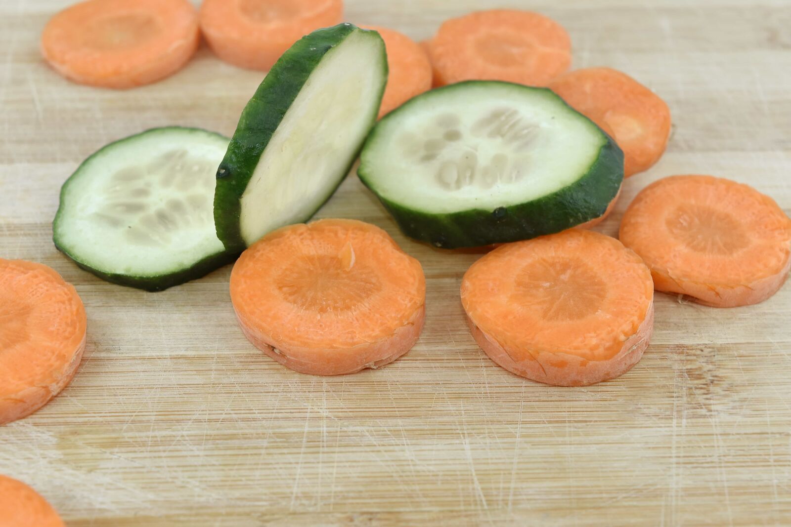 Nikon D5500 sample photo. Carrot, cucumber, slices, diet photography