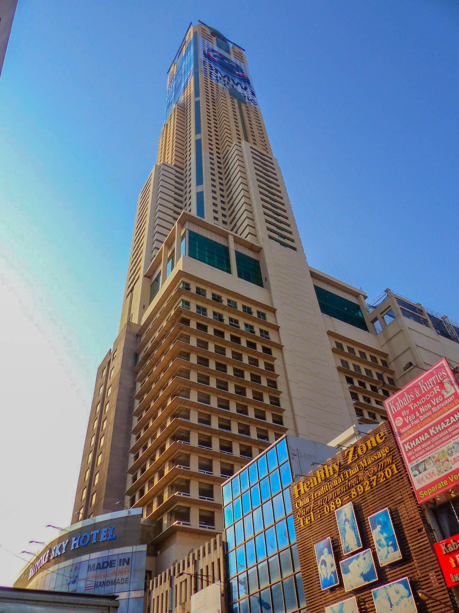 Panasonic Lumix DMC-FZ200 sample photo. Gratte ciel, sky, city photography