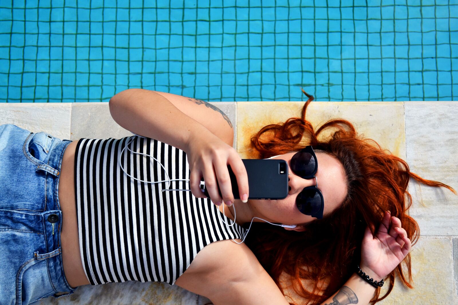 Nikon D3100 sample photo. Earphones, female, lying down photography