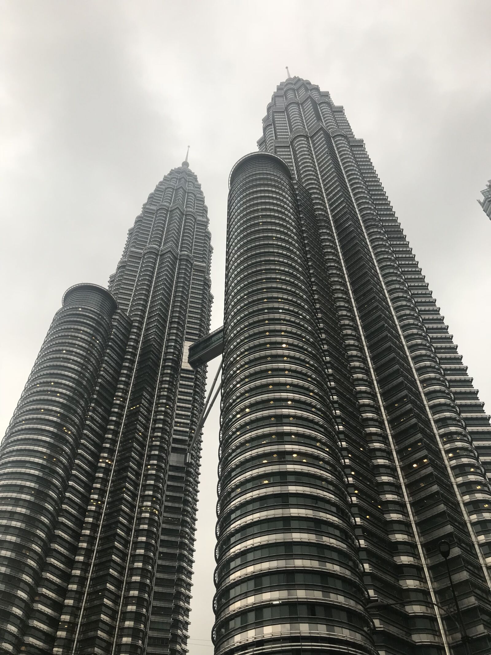 iPhone 7 Plus back dual camera 3.99mm f/1.8 sample photo. Kuala lumpur, towers, sky photography