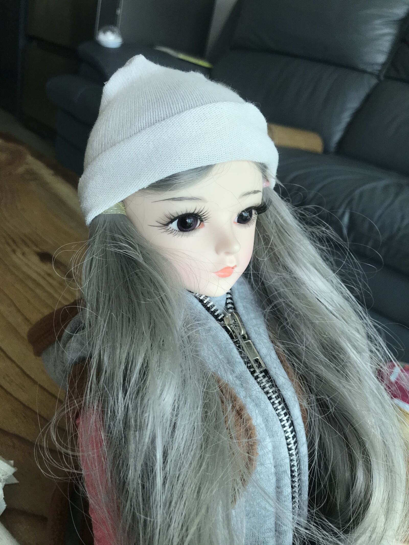 iPhone 7 back camera 3.99mm f/1.8 sample photo. Doll, cap, doris brick photography
