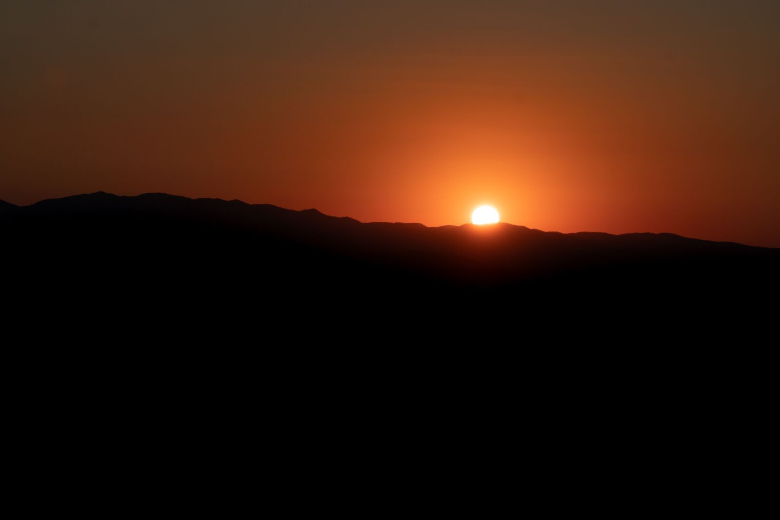 Sony E PZ 18-105mm F4 G OSS sample photo. Sunset, orange, evening photography