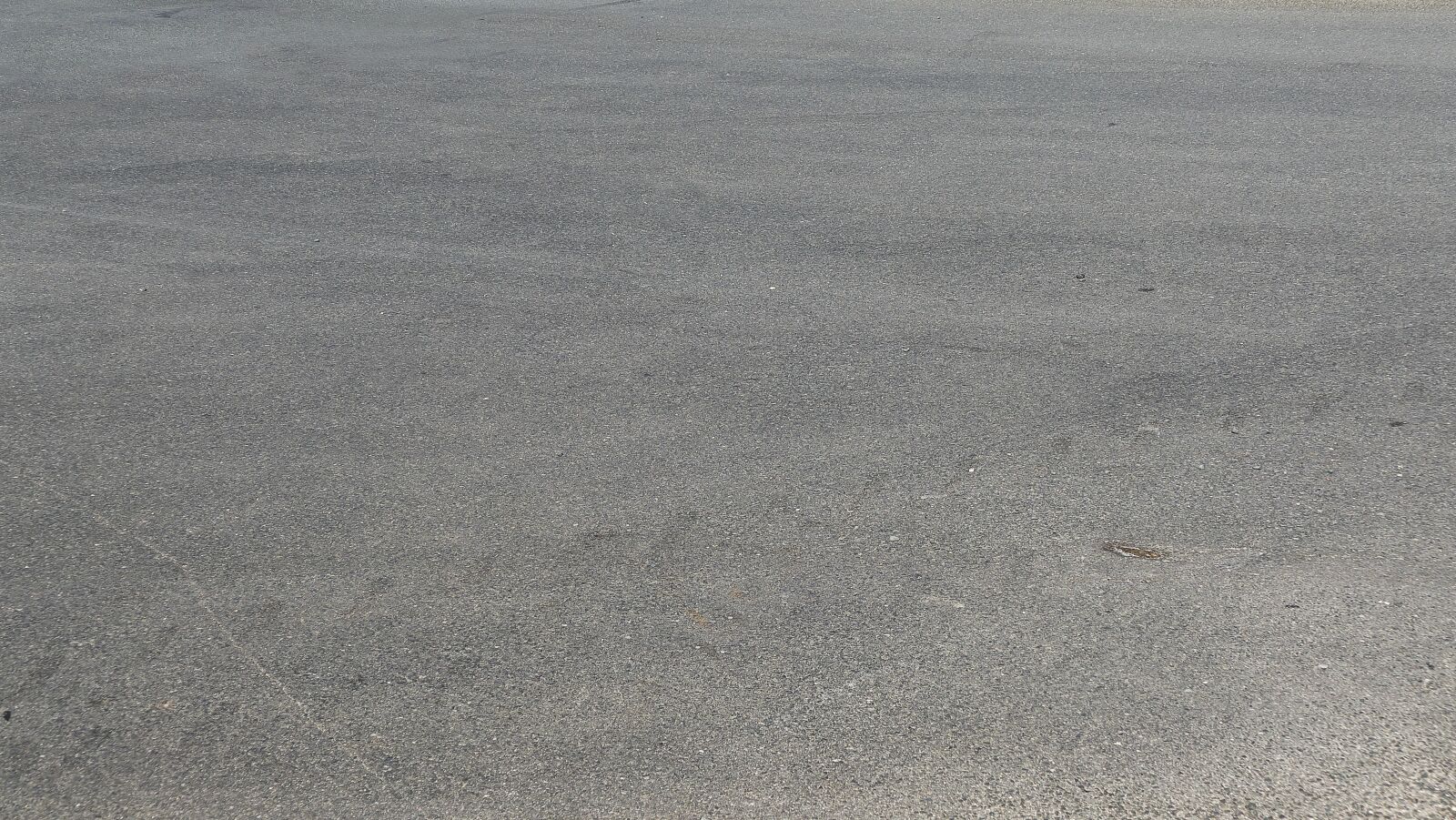 Panasonic Lumix DMC-FZ1000 sample photo. Asphalt, ground, fixed photography