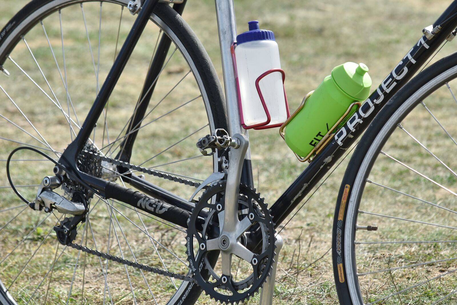 Nikon D5500 sample photo. Bicycle, bottled water, bottles photography