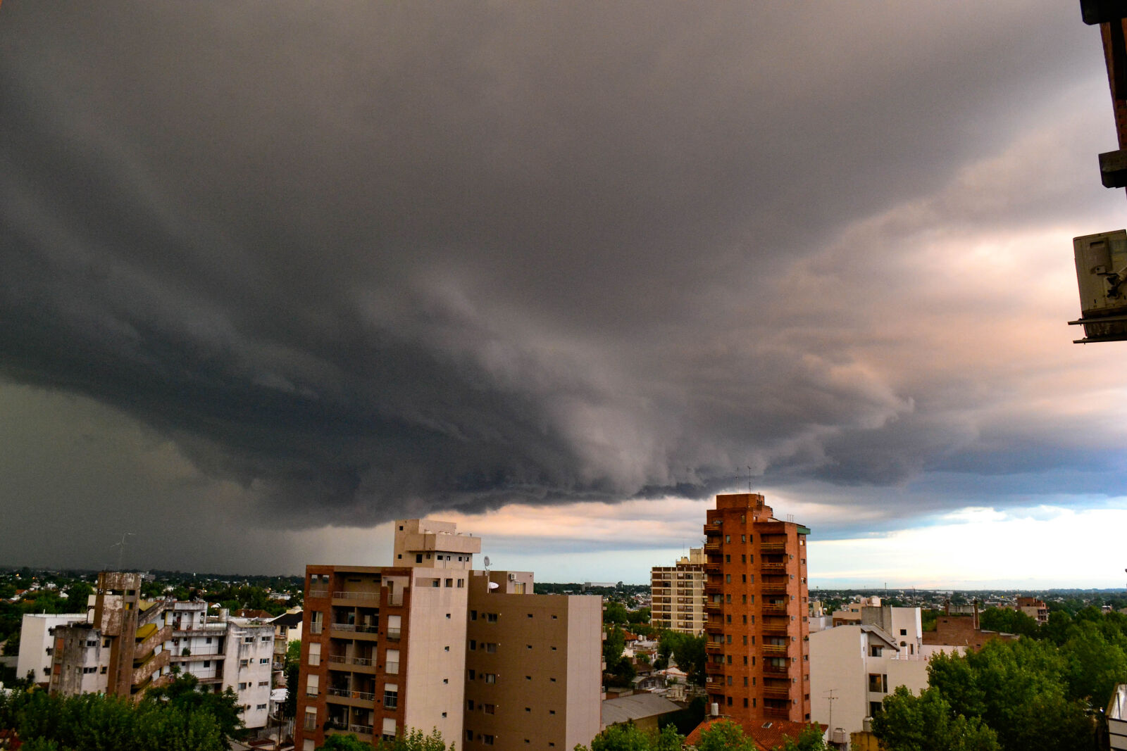 Nikon D3100 sample photo. Buildings, storm photography