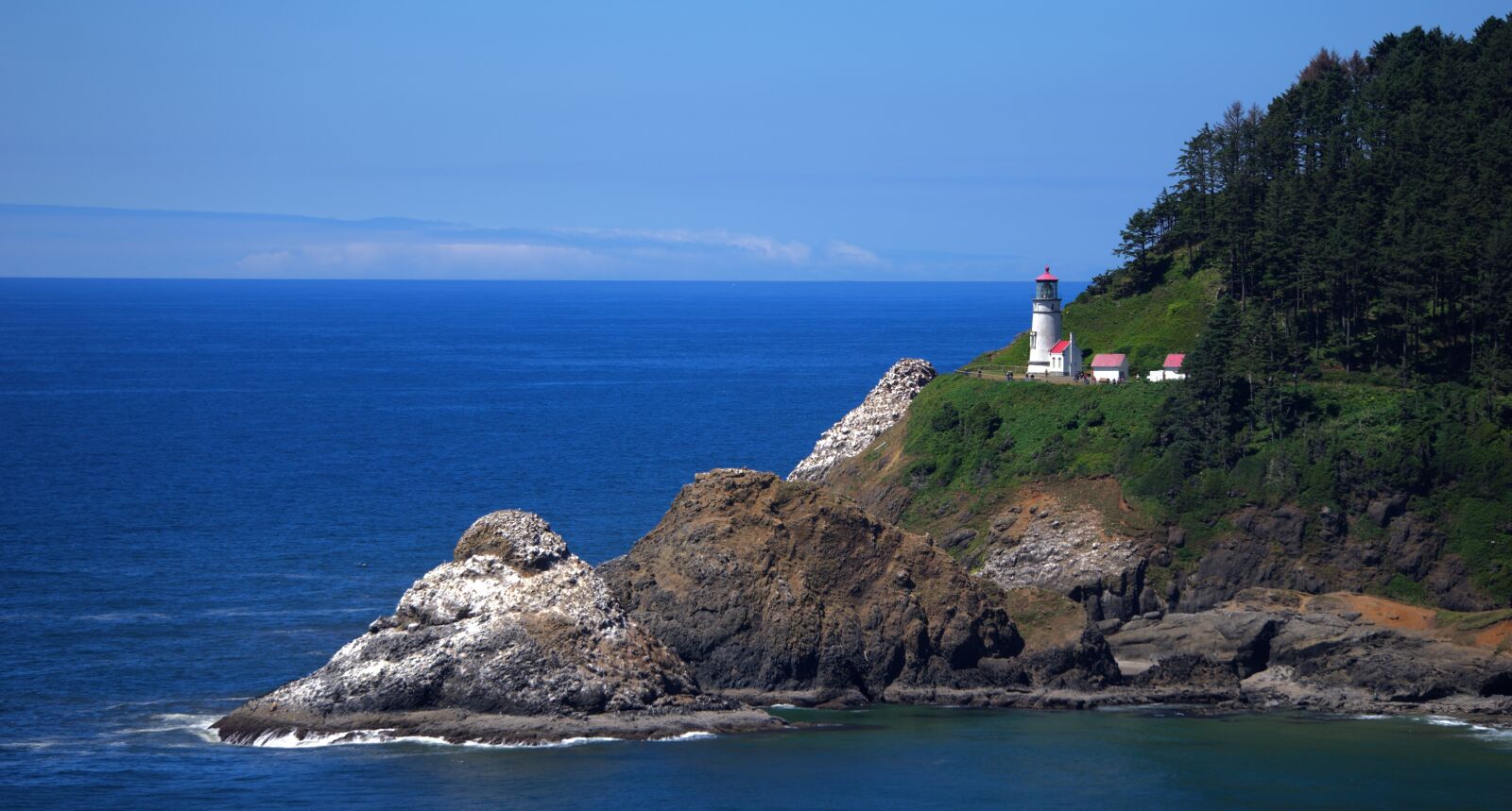Sony a6000 sample photo. Lighthouse, ocean, blue sky photography