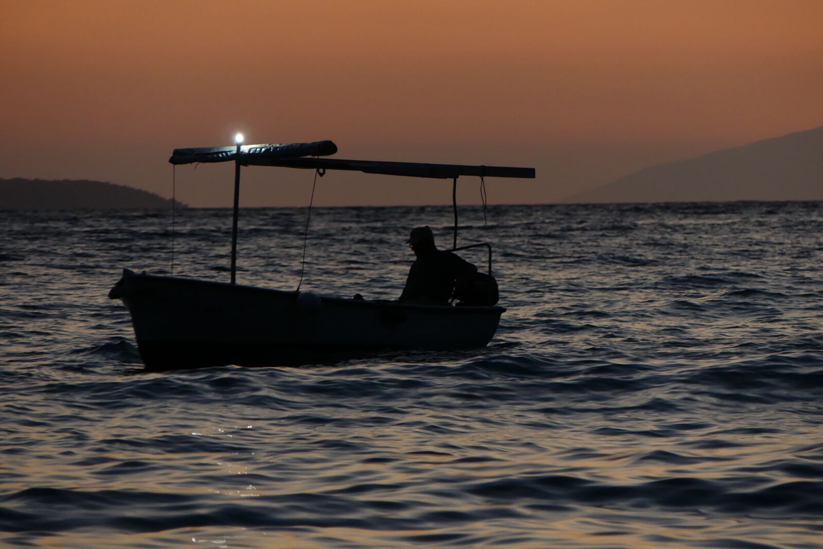 Panasonic Lumix DMC-FZ300 sample photo. Boat, the fisherman, nature photography