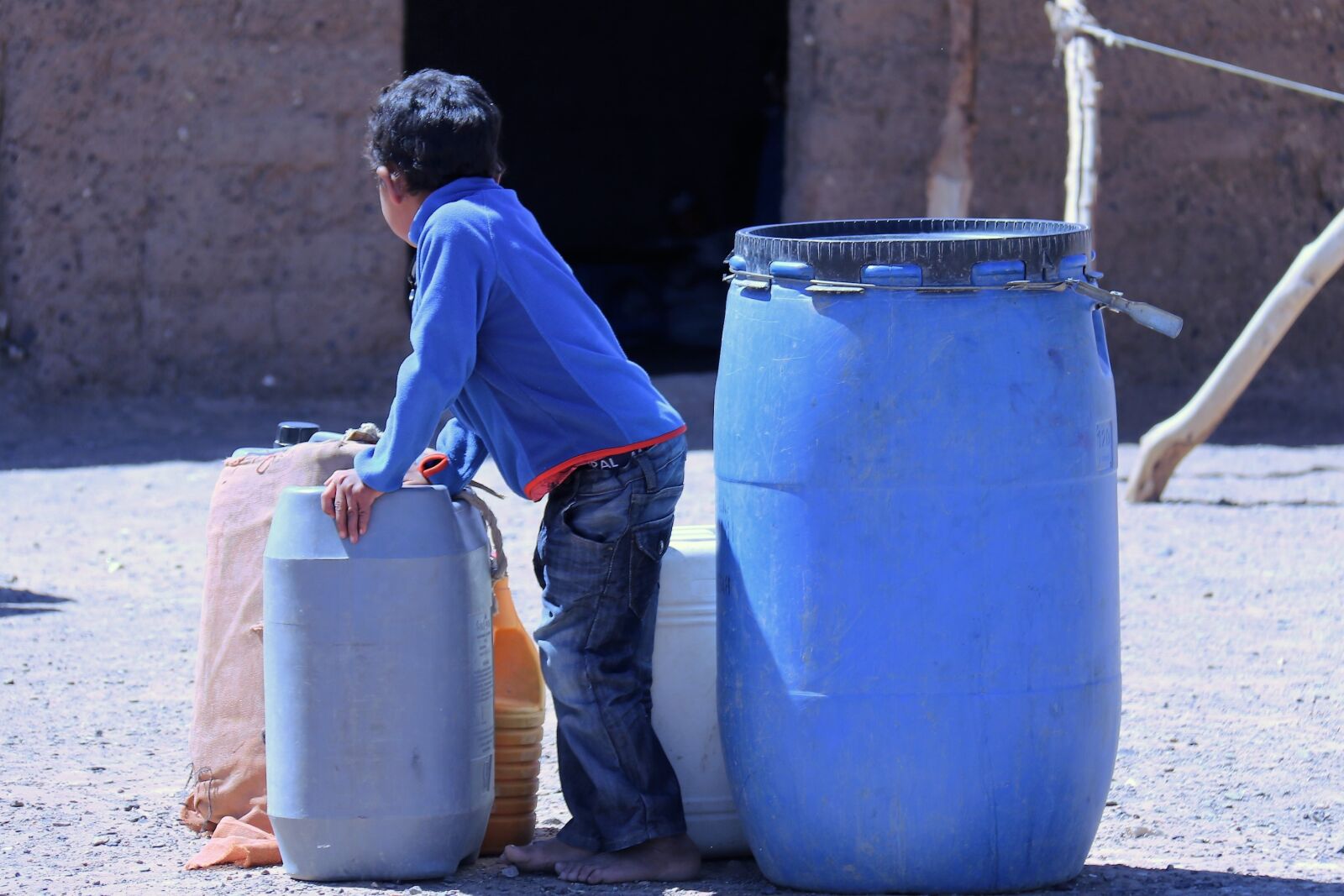 Canon EOS 70D sample photo. Poor boy, people, container photography