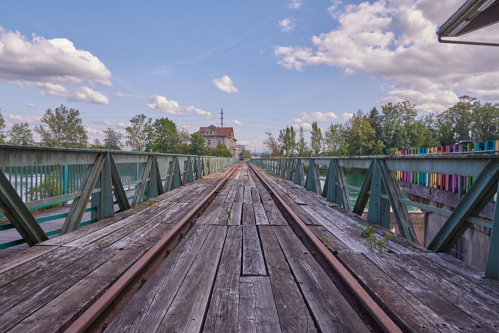 Nikon D7200 sample photo. Tracks, clouds, bridge photography