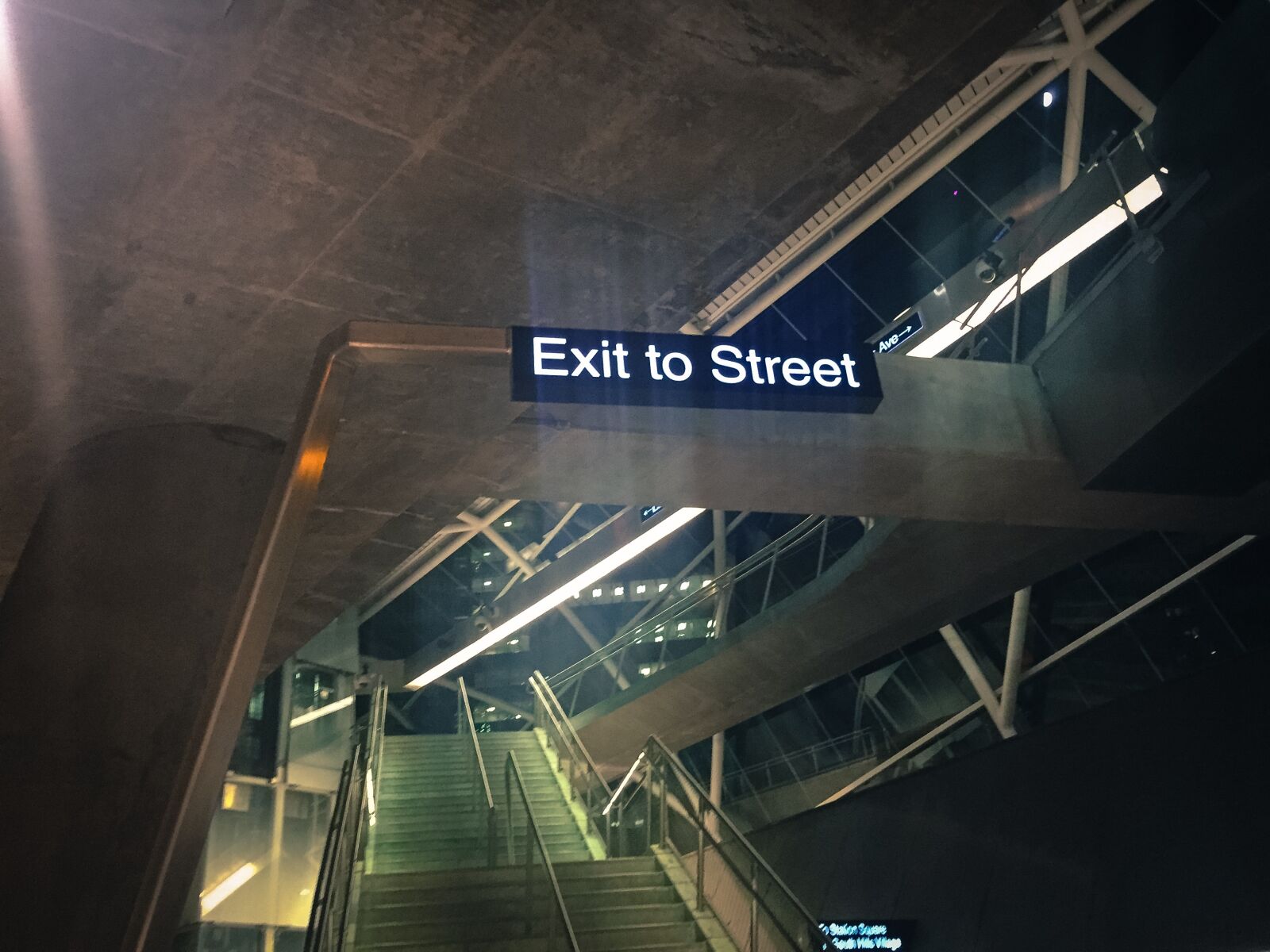 Apple iPhone 6 sample photo. Concrete, glass, night, sign photography
