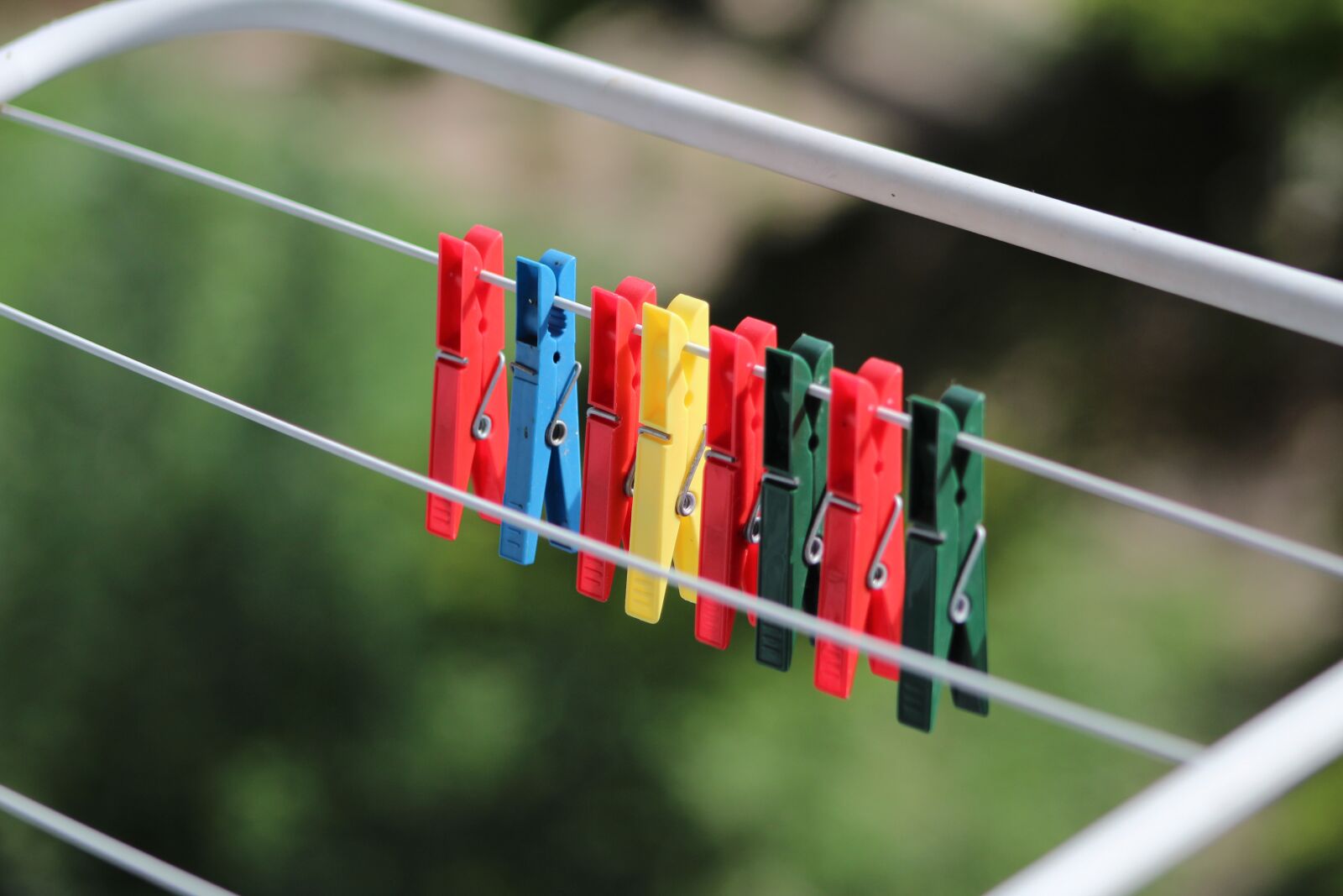 Canon EF75-300mm f/4-5.6 sample photo. Paper clips, wash, buckles photography