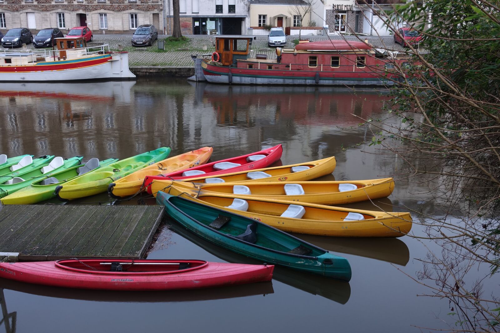 Sony Cyber-shot DSC-RX100 III sample photo. Canoe, river, colors photography