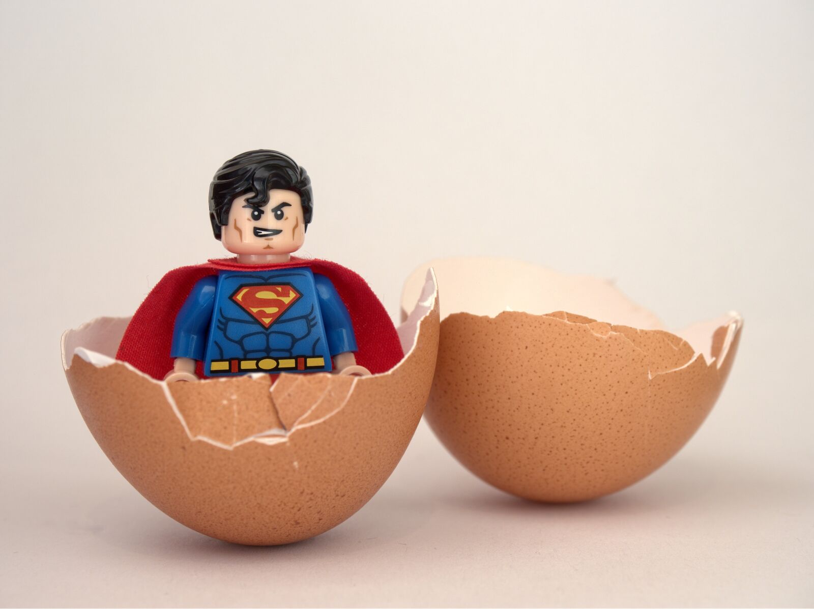 Olympus OM-D E-M5 sample photo. Superman, lego, egg photography