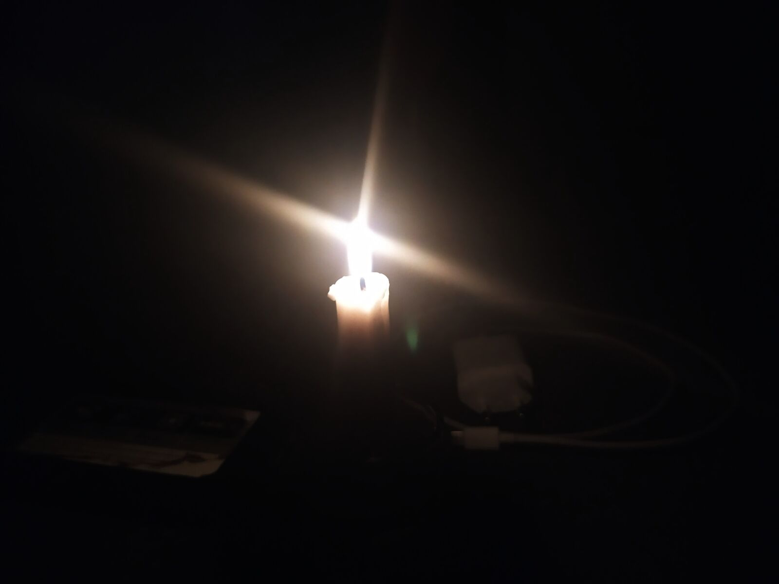 Xiaomi Redmi Note 7 sample photo. Black, concentrated, candle photography