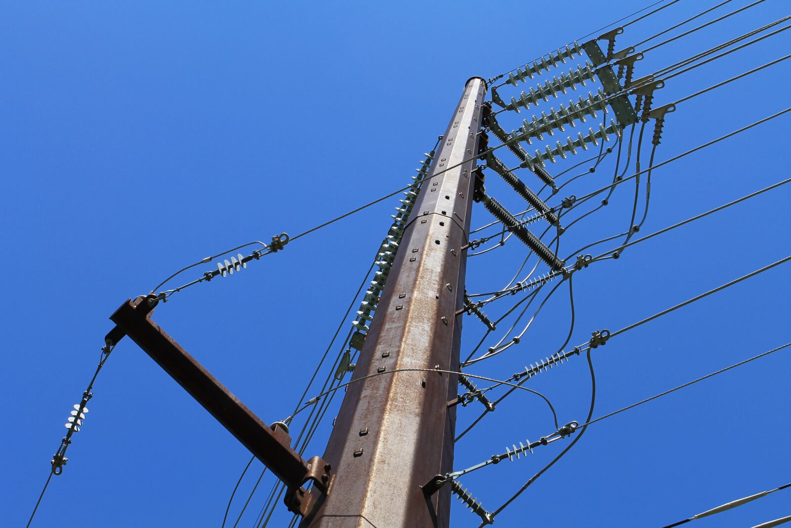 Canon EOS 1100D (EOS Rebel T3 / EOS Kiss X50) sample photo. Poles, power, sky photography