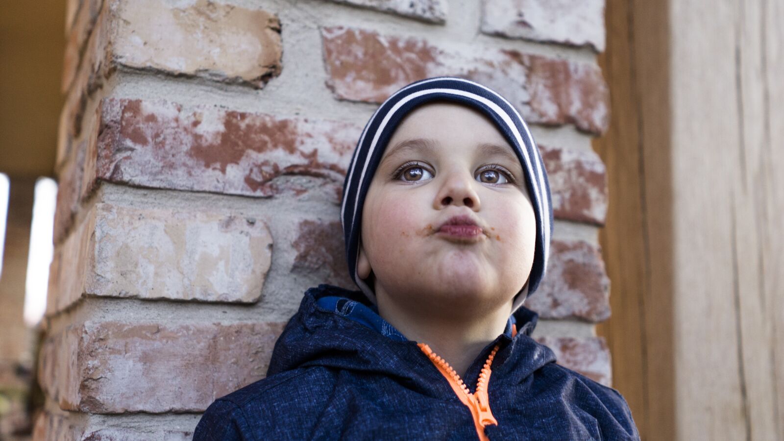 Sony FE 28mm F2 sample photo. Child, face, detail photography