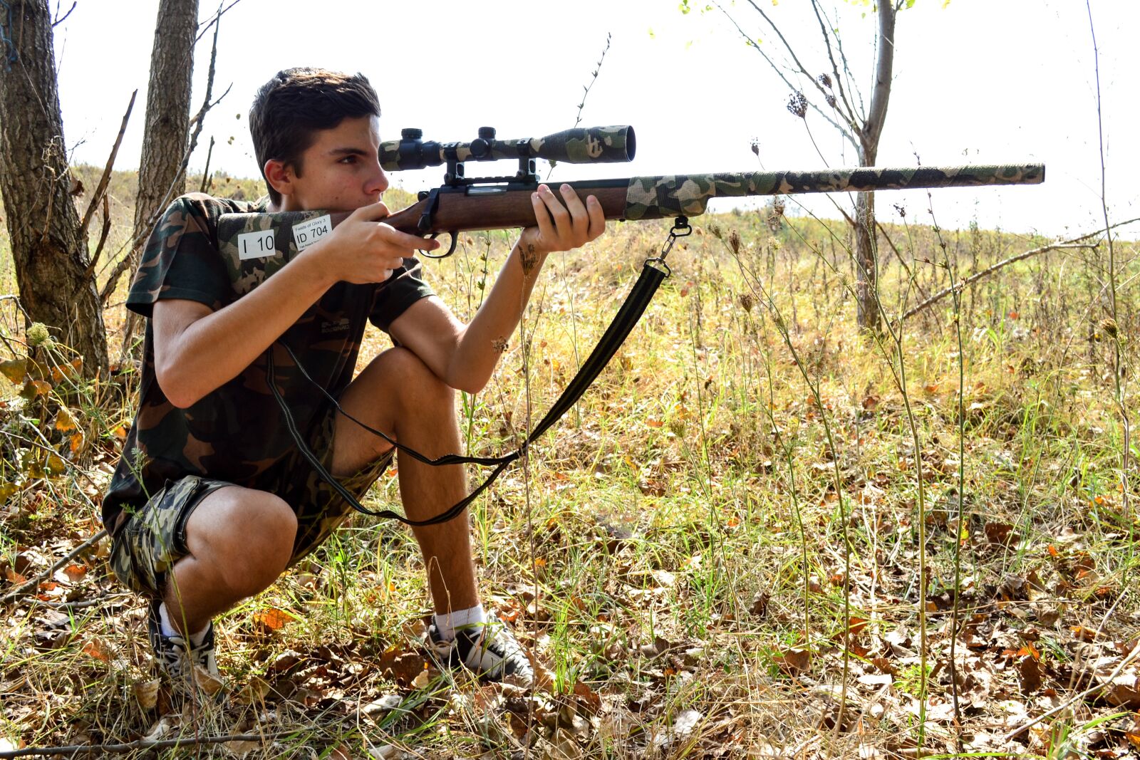 Nikon D3100 sample photo. Sniper, guy, rifle photography