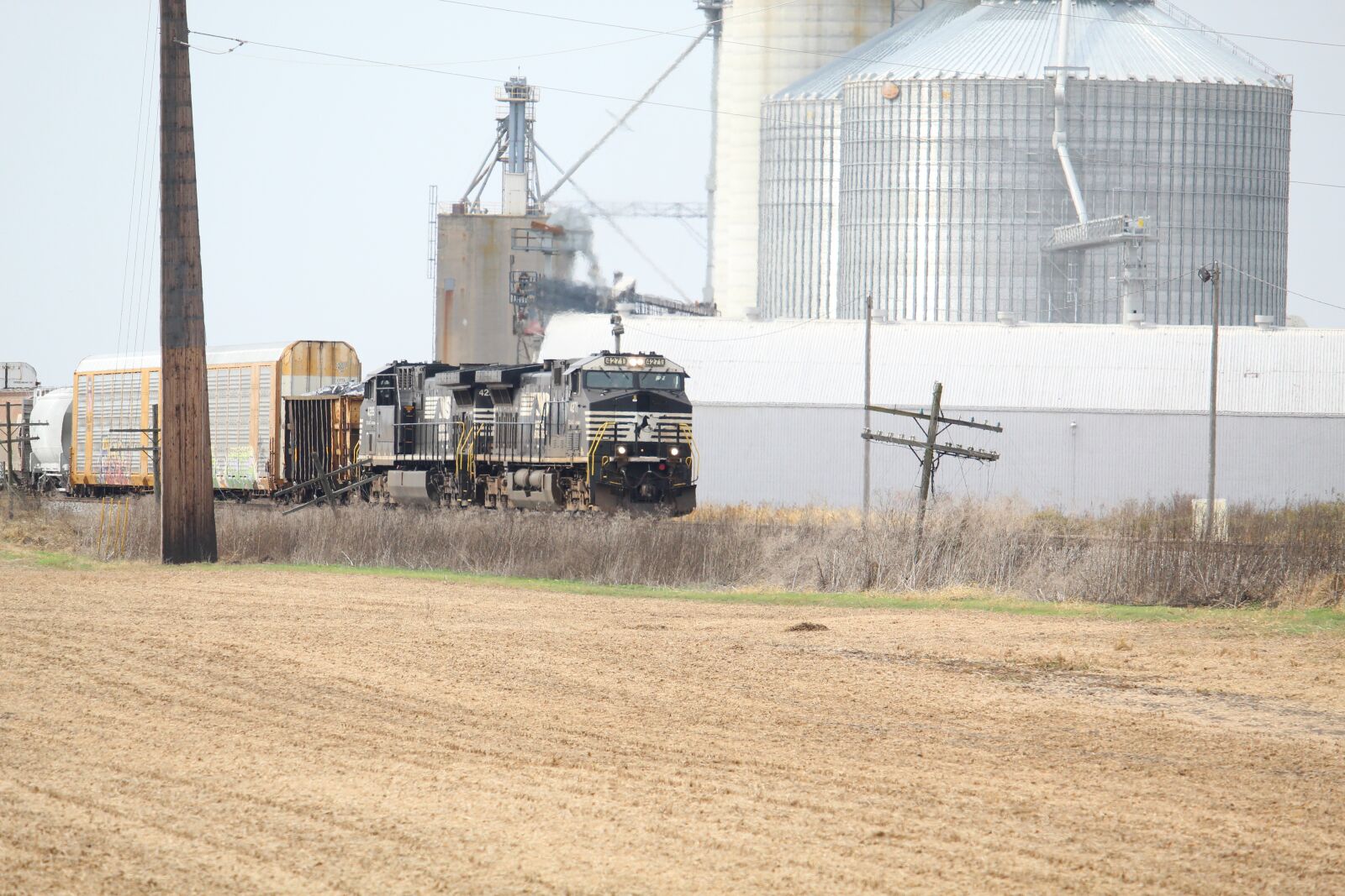Canon EF-S 55-250mm F4-5.6 IS STM sample photo. Railroad, grain, silos photography